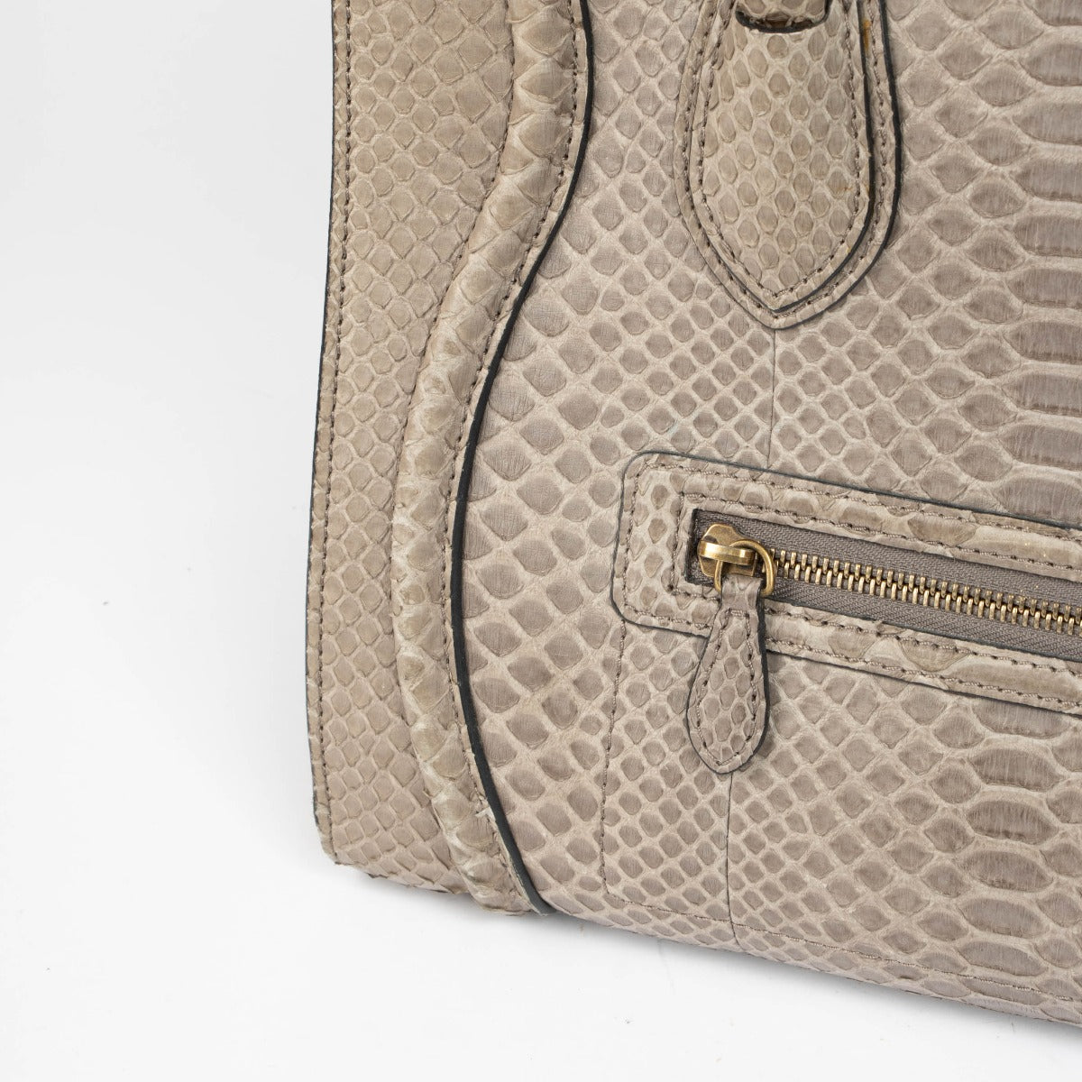 Authentic pre-loved Celine Grey Python Mini Luggage Bag on Labellov.com