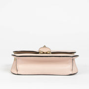 Shop this 100% authentic Valentino Garavani Pink Small Glam Lock Bag at Labellov.com