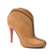 Christian Louboutin Nude Rivet Booties for sale online at Labellov