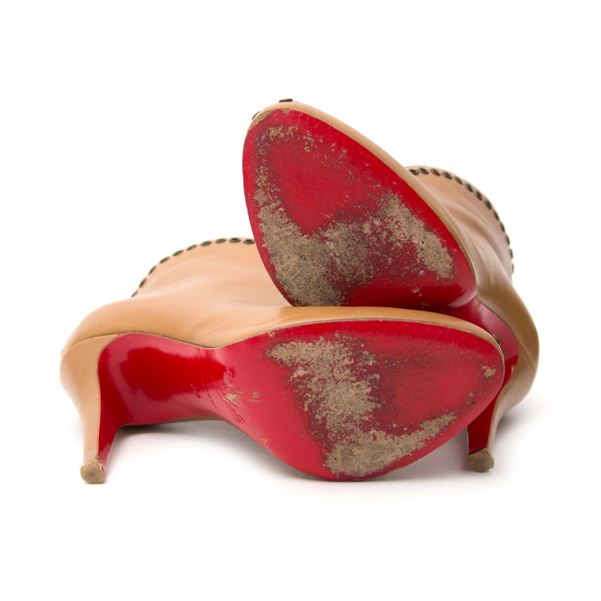 Are you interested in an authentic Christian Louboutin Nude Rivet Booties