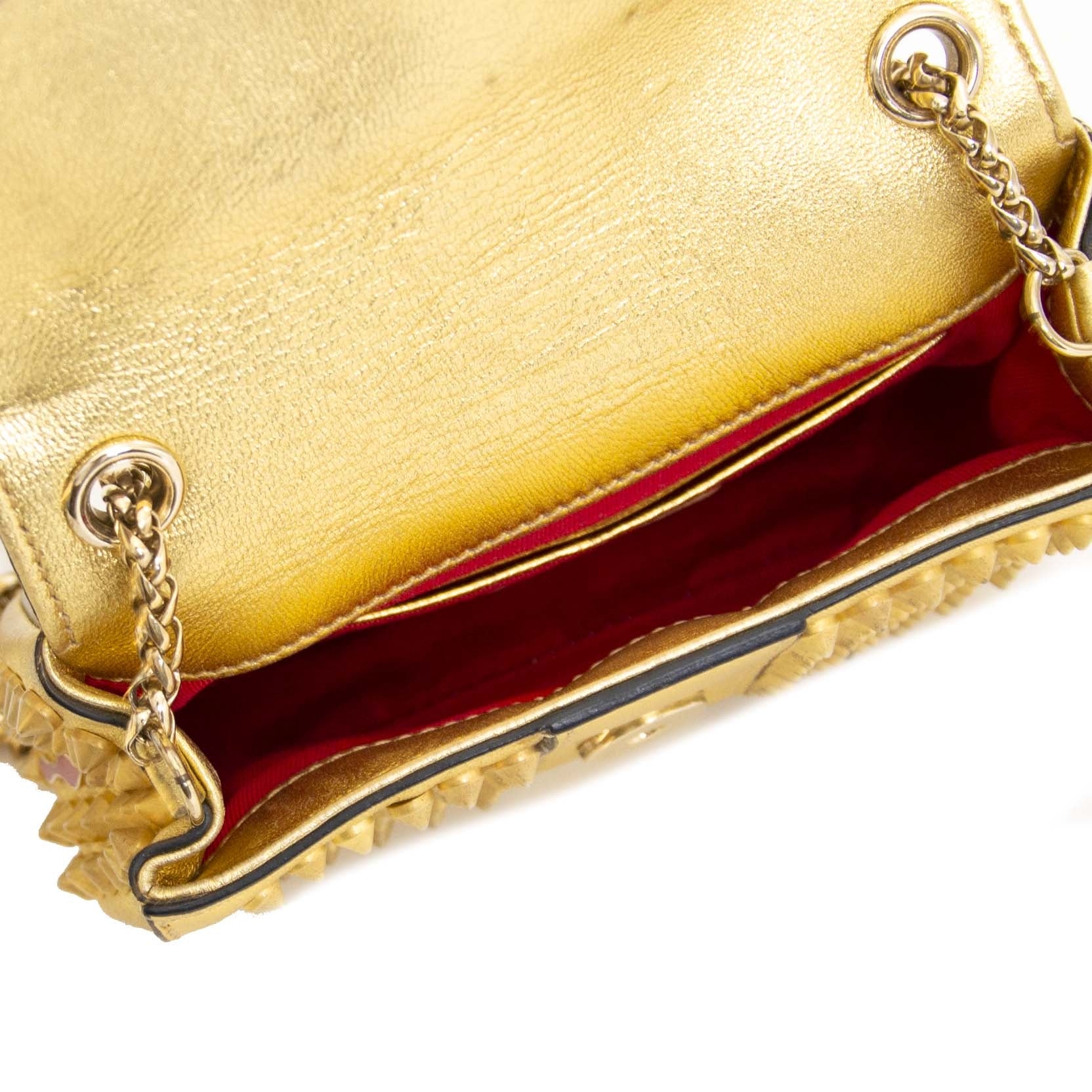 Goud Louboutin handtas bij Labellov Antwerpen. Veilig online winkelen