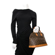 koop veilig online aan de beste prijs jou tweedehands desiger Vintage Louis Vuitton PM Alma voor de beste prijs