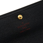 Brand new Louis Vuitton Black Epi Wallet for sale on designer vintage webshop Labellov