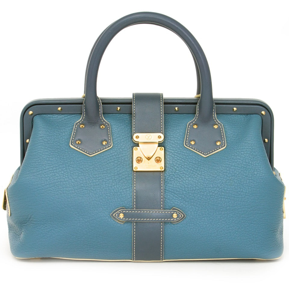 Authentieke Louis Vuitton l'ingenieux blauw dokterstas voor de juiste prijs bij LabelLOV vintage webshop. Louis Vuitton Suhali L'ingenieux bicolor blue shoulder bag.Veilig online winkelen. Luxe, vintage, mode. Antwerpen, België.