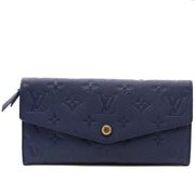 acheter en ligne pour le meilleur prix Louis Vuitton Curieuse Wallet Monogram Empreinte