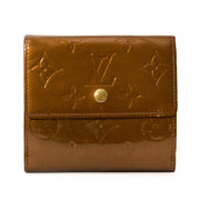 Buy your authentic Louis Vuitton Bronze Vernis Leather Elise Wallet for the best price
