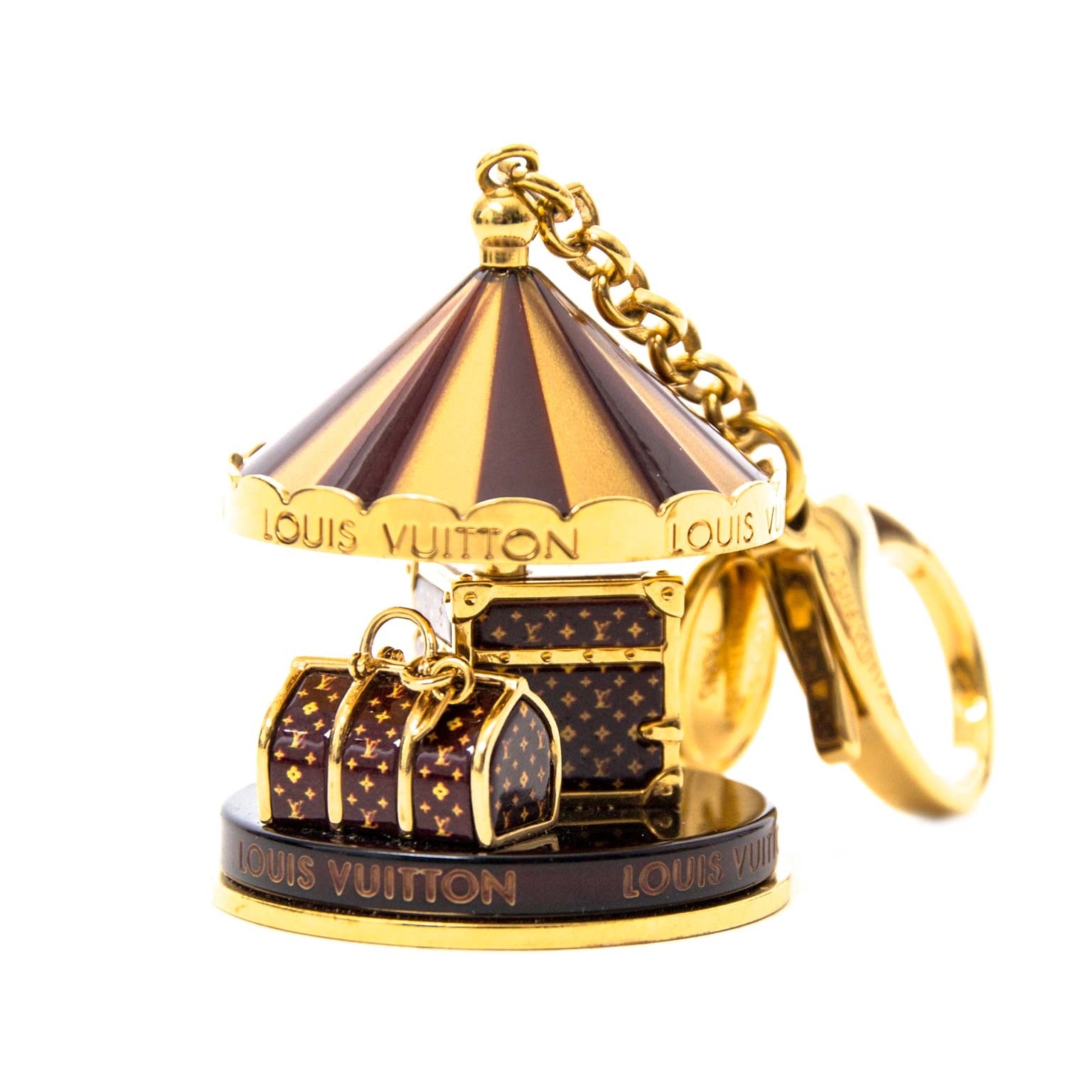 acheter en ligne seconde main limited louis vuitton gold brown monogram carousel keychain