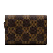 Are you interested in an authentic Louis Vuitton Damier Coin Purse?