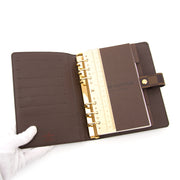 Buy and sell your Louis Vuitton Damier Ebene Agenda MM for the best price at Labellov