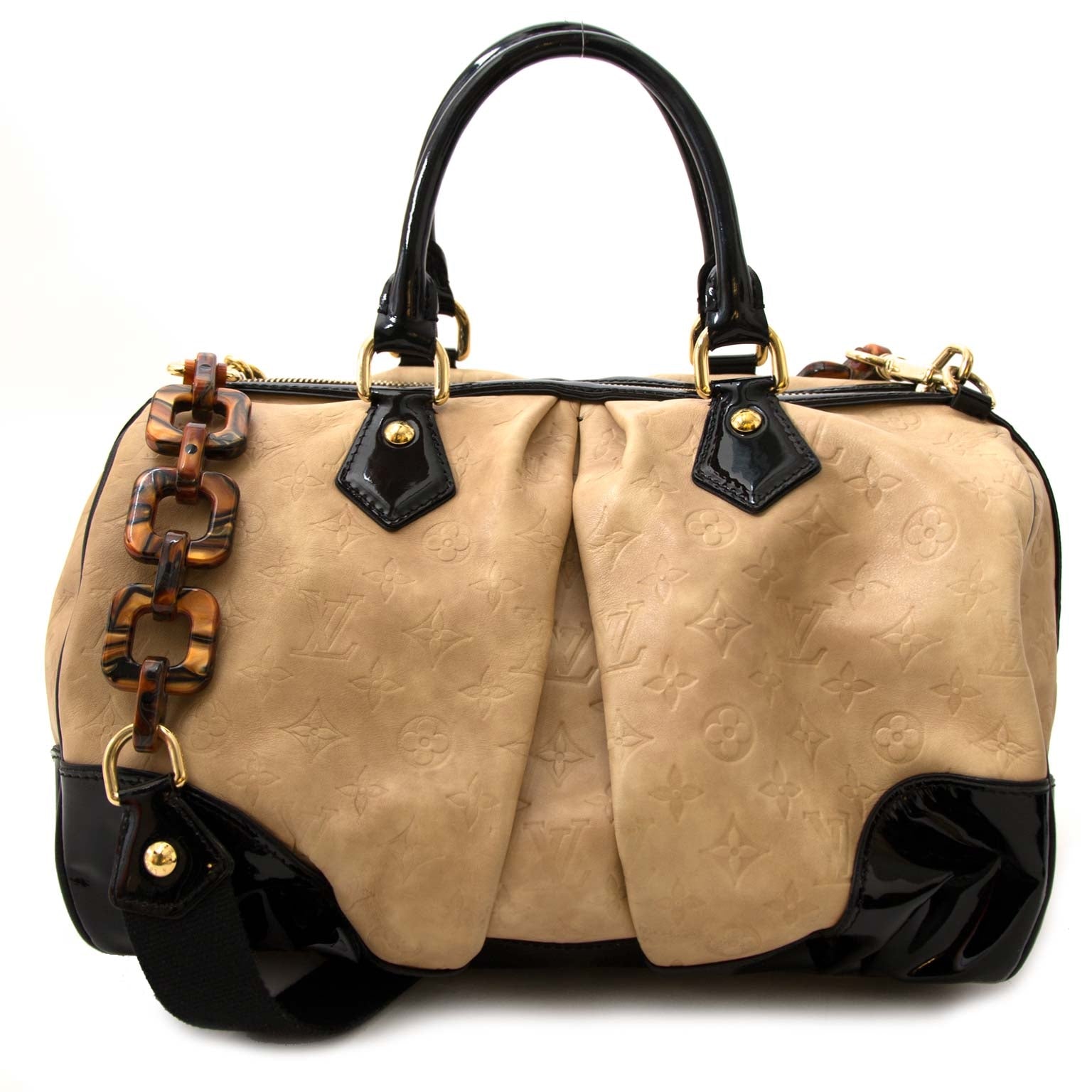 Limited edition Louis Vuitton Limited Edition Ivory Embossed Monogram Stephen Bag