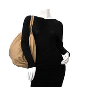 Louis Vuitton Mahina Beige Leather Perforated Monogram Large Hobo Bag Buy authentic designer Louis Vuitton secondhand bags at Labellov at the best price. Safe and secure shopping. Koop tweedehands authentieke Vuitton tassen bij designer webwinkel labellov