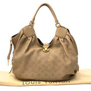 Louis Vuitton Mahina Beige Leather Perforated Monogram Large Hobo Bag Buy authentic designer Louis Vuitton secondhand bags at Labellov at the best price. Safe and secure shopping. Koop tweedehands authentieke Vuitton tassen bij designer webwinkel labellov
