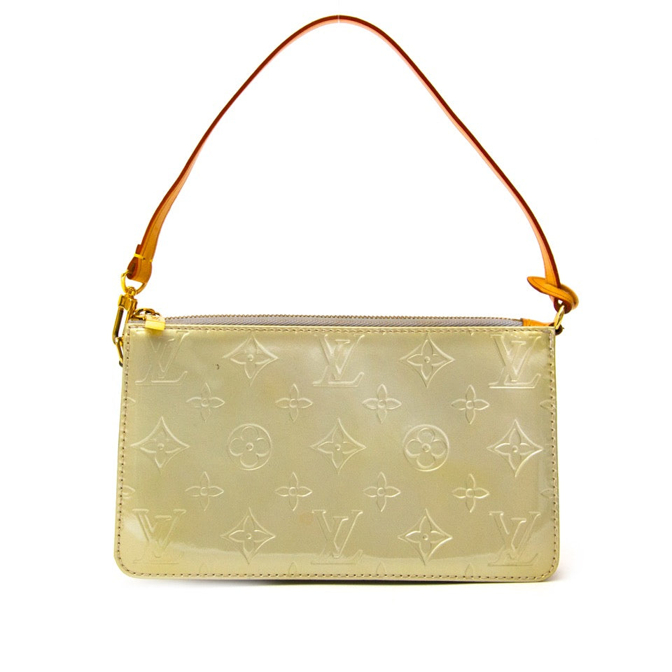 Louis Vuitton Lexington Pochette Monogram Vernis with adjustable strap for the best price on secondhand designer site Labellov