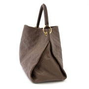 Koop nu deze Louis Vuitton Artsy MM Monogram Empreinte bag online or in store, very good condition and reasonable price.