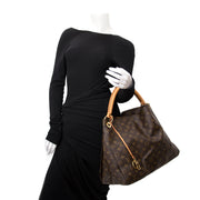 koop veilig online aan de beste prijs Louis Vuitton Monogram Artsy MM Top Handle Bag