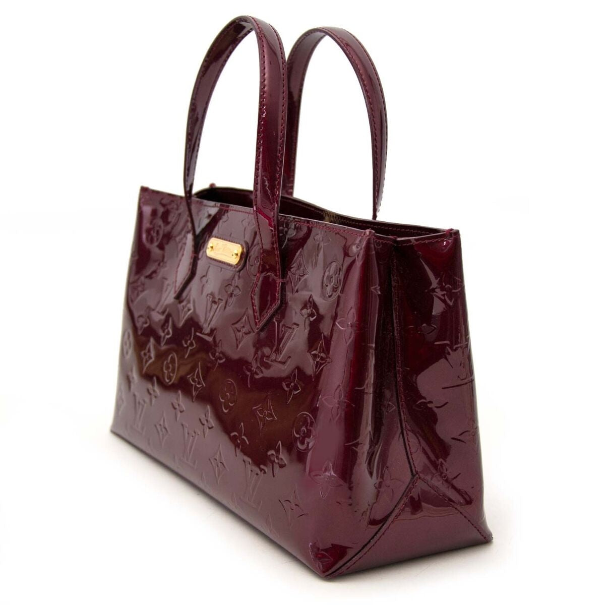 Achetez un authentique Louis Vuitton Wilshire sac à main en monogramme pour le bon prix chez LabelLOV.