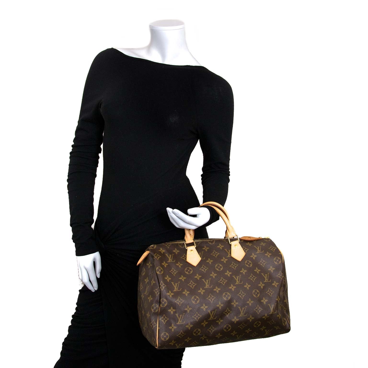 authentic Louis Vuitton Monogram Speedy 35 now for sale at labellov.com for the best price