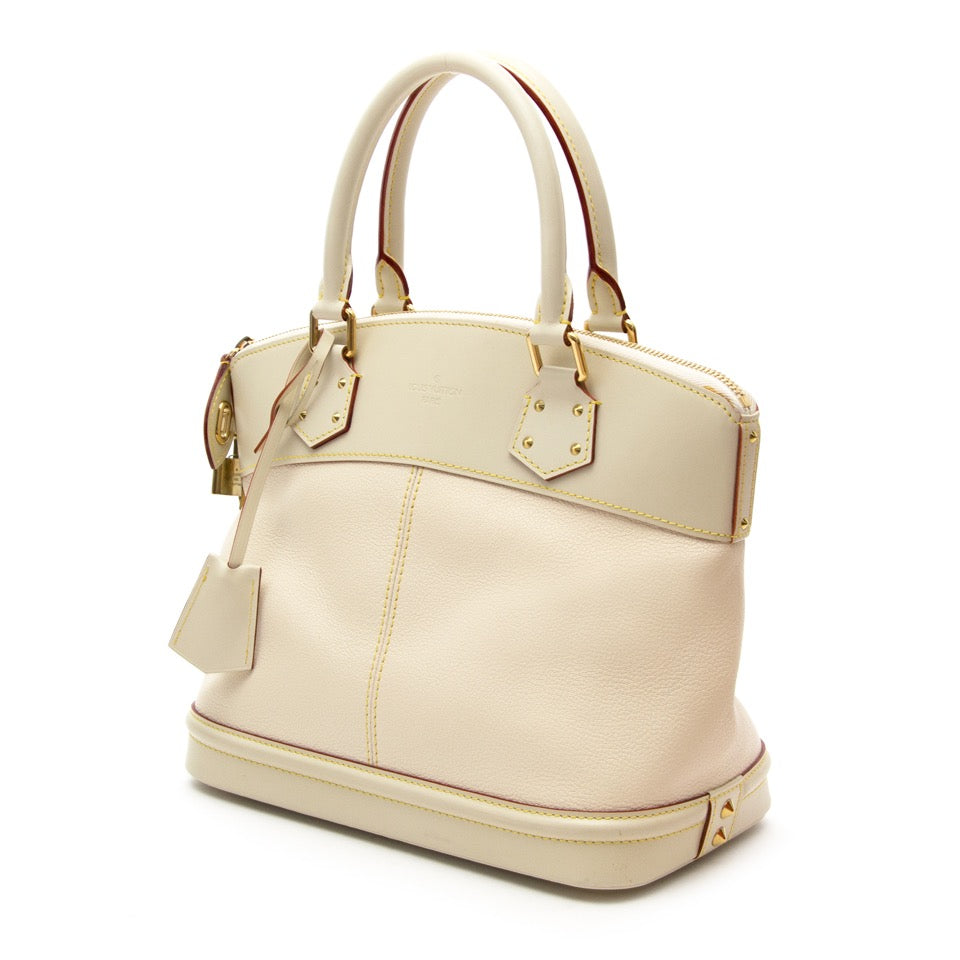 Buy Louis Vuitton lockit gm bag at the right price at LabelLOV vintage webshop. Luxe, vintage, fashion. Safe and secure online shopping. Antwerp, Belgium.