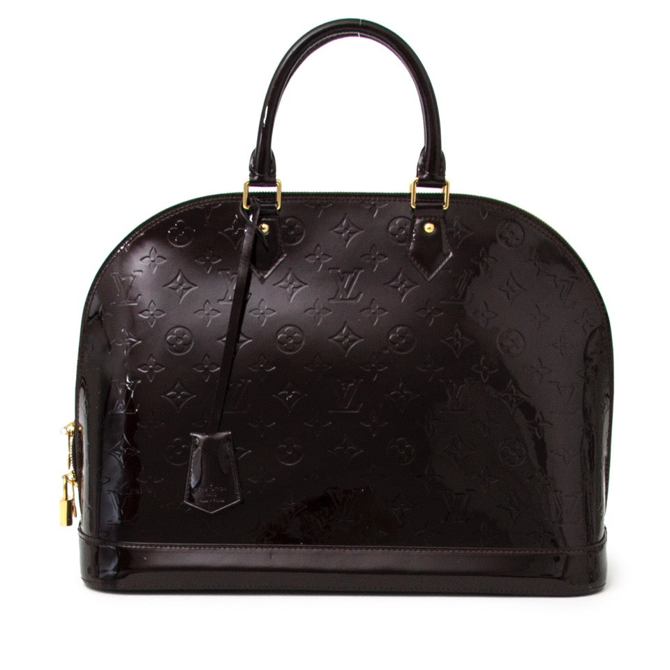 Authentieke Louis Vuitton Alma MM amarante zwart donker voor de juiste prijs bij LabelLOV vintage webshop. Louis Vuitton Alma MM Amarante black dark . Veilig online winkelen. Luxe, vintage, mode. Antwerpen, België.