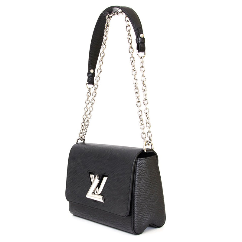 Buy Louis Vuitton twist epi black mm 23 at the right price at LabelLOV vintage webshop. Luxe, vintage, fashion. Safe and secure online shopping. Antwerp, Belgium.