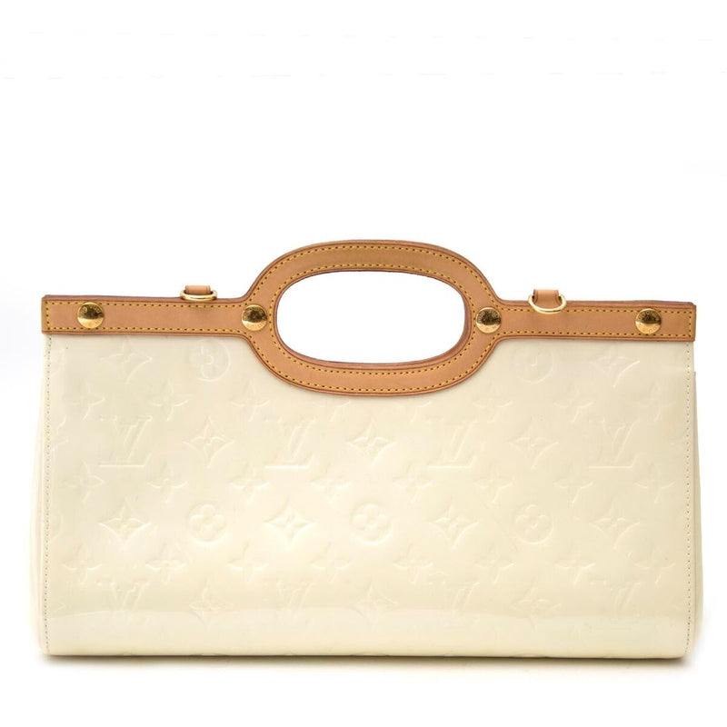 Buy an authentic secondhand Louis Vuitton Creme Roxbury Drive Bag bag at the right price at LabelLOV vintage webshop. Safe and secure online shopping.