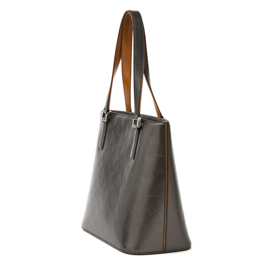 Buy Brand New louis vuitton housotn matte grey. at the right price at LabelLOV vintage webshop. Luxe, vintage, fashion. Safe and secure online shopping. Antwerp, Belgium.