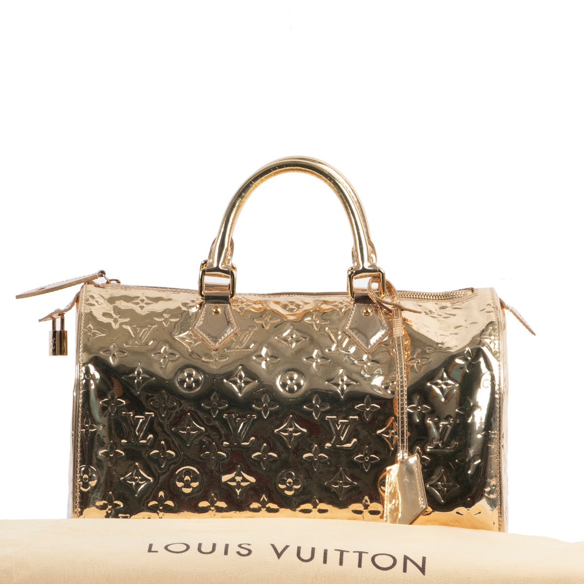 Original Louis Vuitton Gold Metallic Top-handle bag in very good condition for sale on Labellov vintage site.