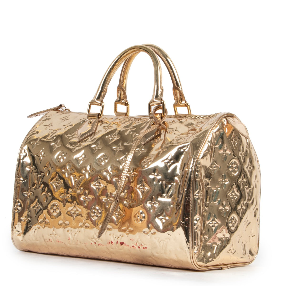 Original Louis Vuitton Gold Metallic Top-handle bag in very good condition for sale on Labellov vintage site.