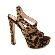 Buy authentic secondhand Miu Miu leopard sandal platform heels in ponyhair at the right price at LabelLOV vintage webshop. Safe and secure online shopping.