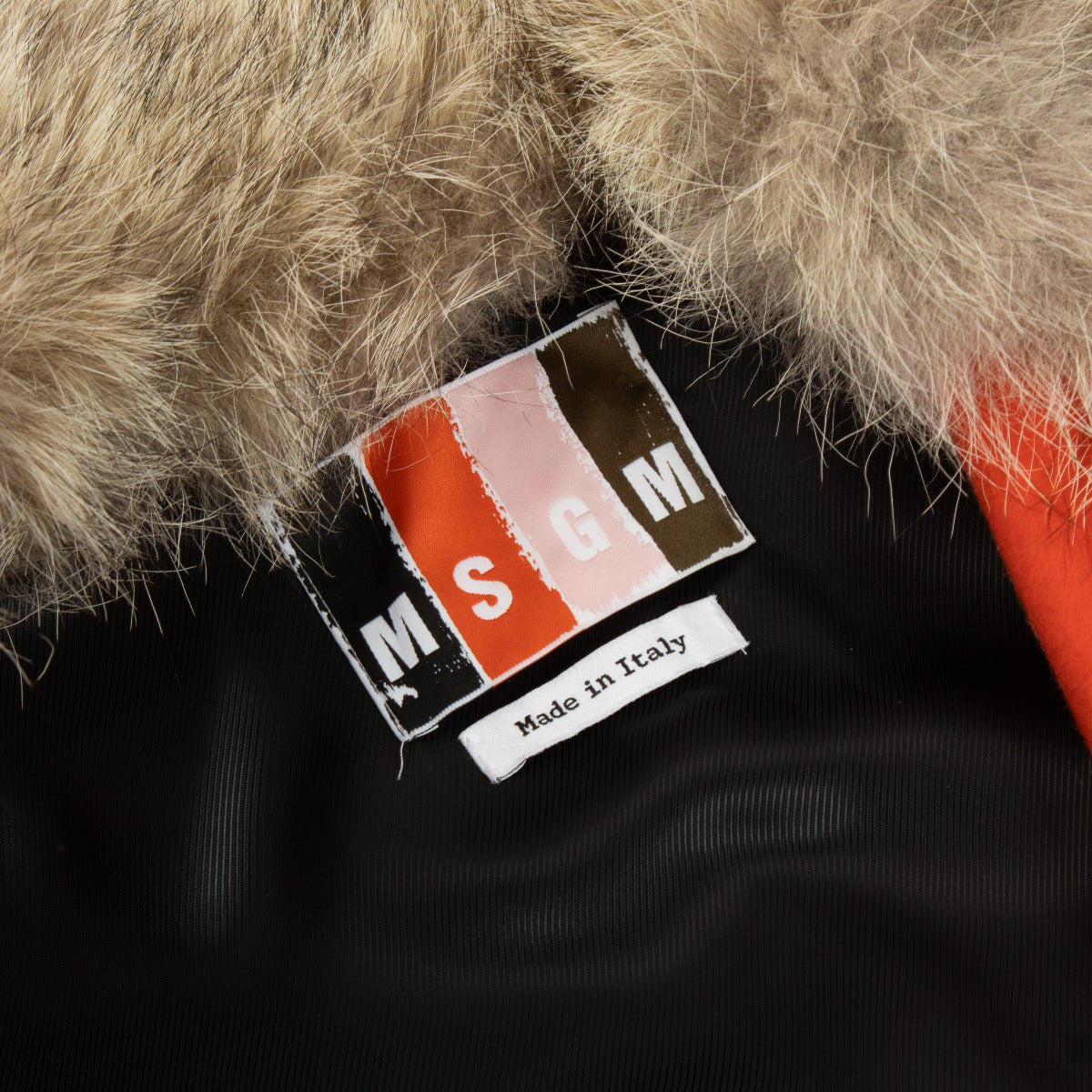 Manteau MSGM orange bordé de fourrure
