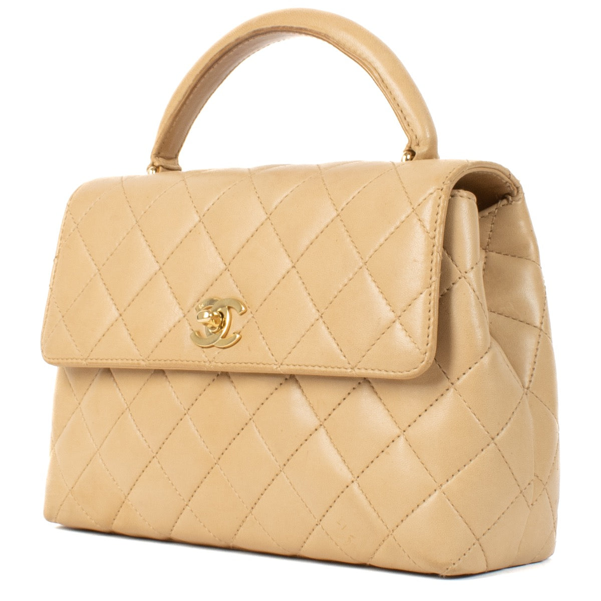 Shop 100% authentic Chanel Beige Lambskin Vintage Coco Handle Bag at Labellov.com.