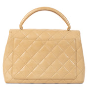 Shop 100% authentic Chanel Beige Lambskin Vintage Coco Handle Bag at Labellov.com.