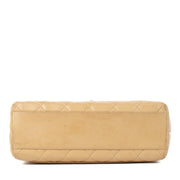 Shop 100% authentic Chanel Beige Lambskin Vintage Coco Handle Bag at Labellov.com.