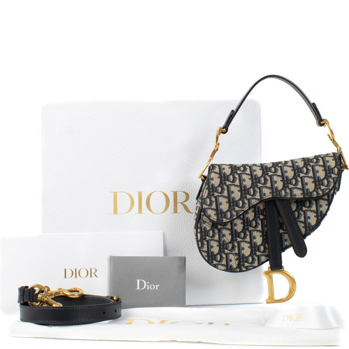 Shop 100% authentic Christian Dior Blue Oblique Mini Saddle Bag at Labellov.com.