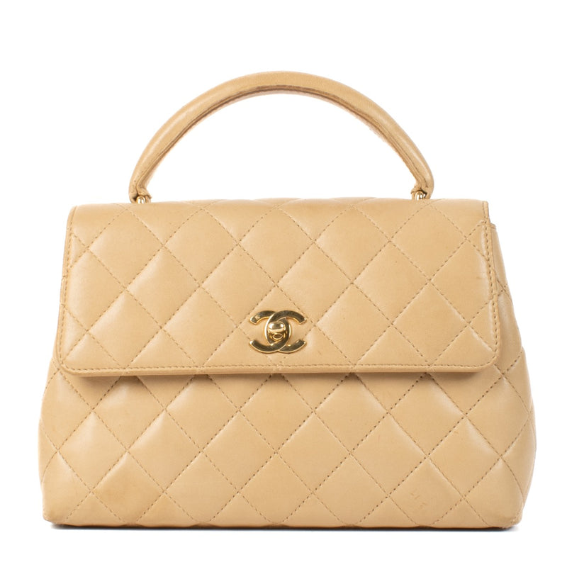 Shop 100% authentic Chanel Beige Lambskin Vintage Coco Handle Bag at Labellov.com.