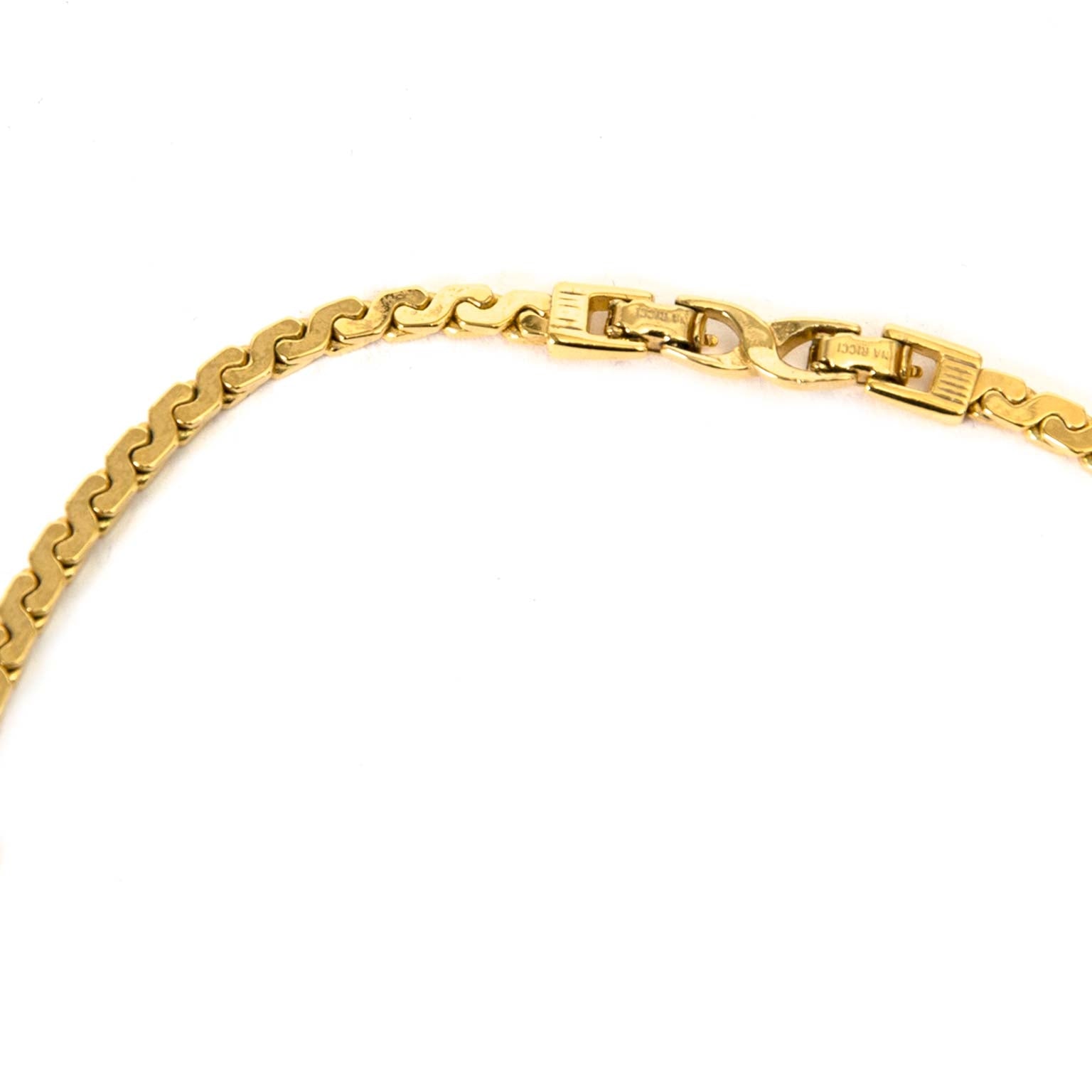 Nina Ricci Goudkleurige Ketting En Clipoorbellen