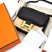 Koop veilig en makkelijk uw authentieke Never Used Hermès Constance 18cm Black Mini Veau Evercalf GHW