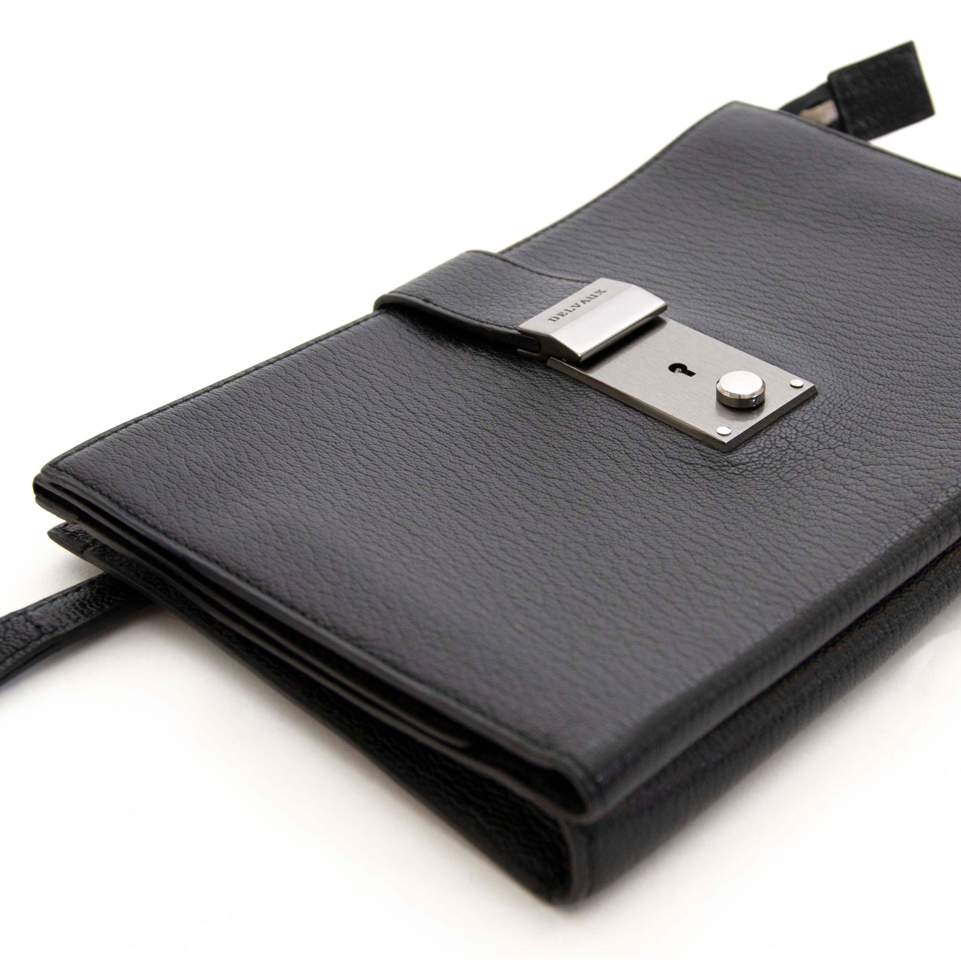 Buy this authentic second hand vintage Delvaux Black Pochette at online webshop LabelLOV