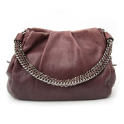 The prada Aubergine Shopper Bag now available in the showroom in Antwerp at the best price.