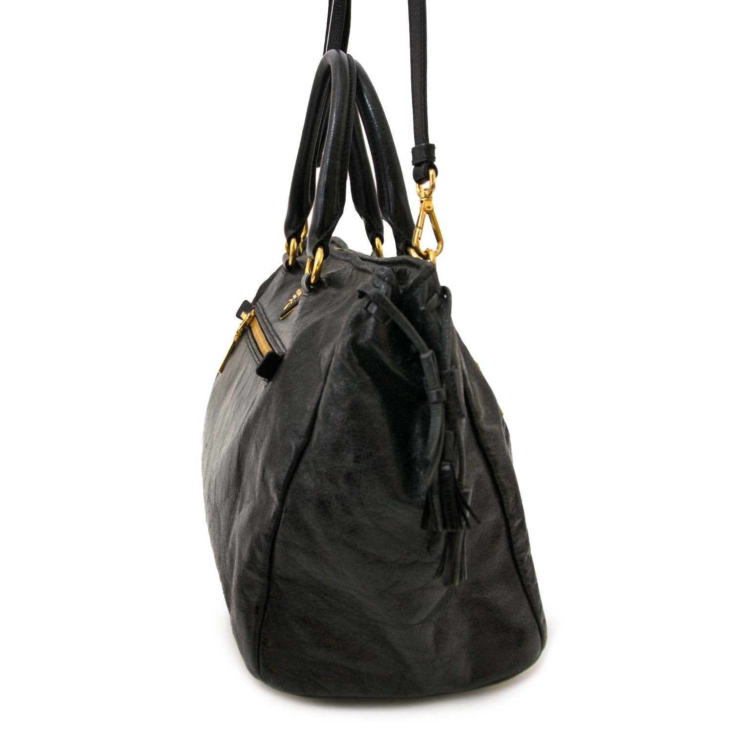veilig online shoppen bij labellov vintage mode webshop met prada front zip tassen