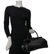 Prada Black Patent Bowling Bag Buy authentic designer Prada secondhand bags at Labellov at the best price. Safe and secure shopping. Koop tweedehands authentieke Prada tassen bij designer webwinkel labellov.