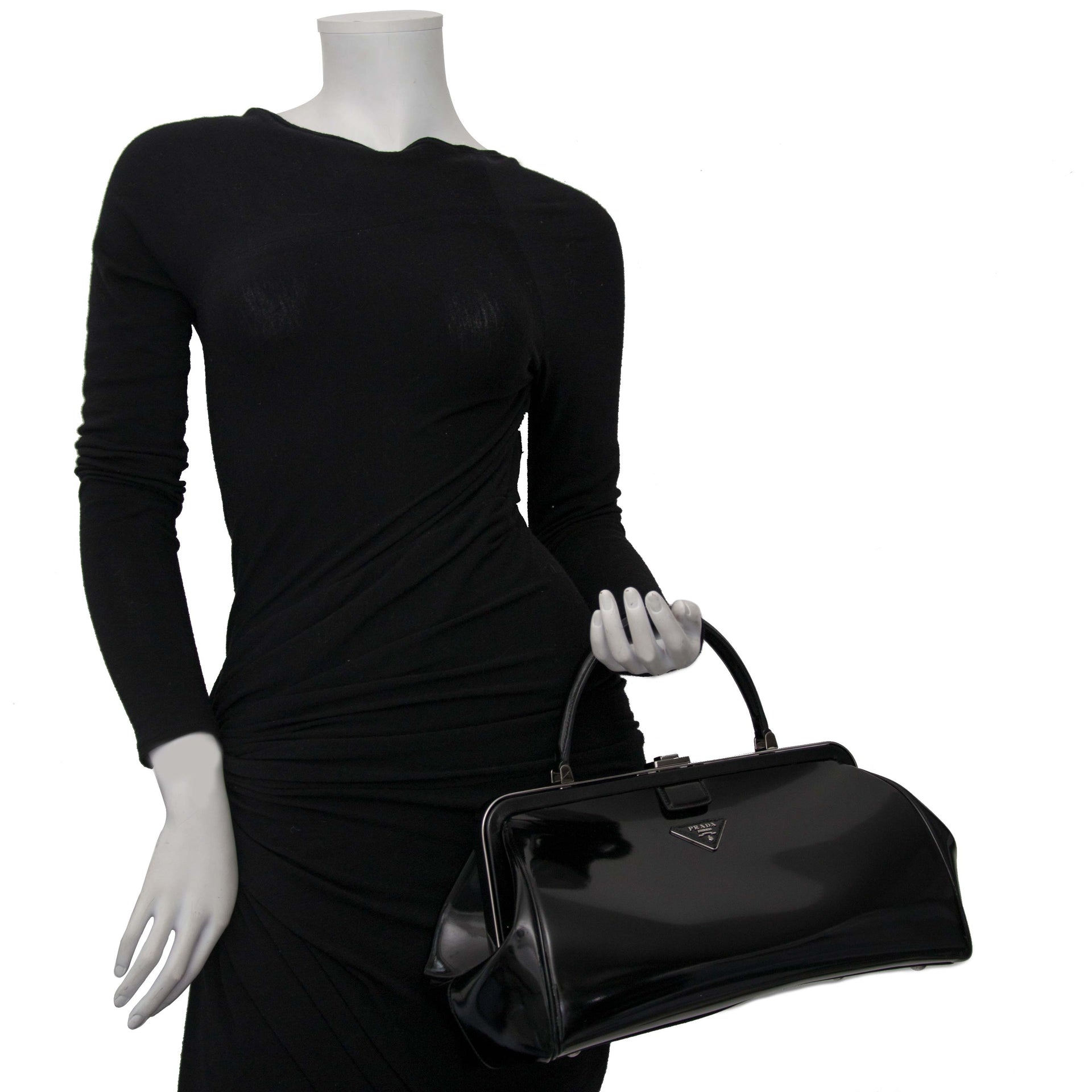 Prada Black Patent Bowling Bag Buy authentic designer Prada secondhand bags at Labellov at the best price. Safe and secure shopping. Koop tweedehands authentieke Prada tassen bij designer webwinkel labellov.