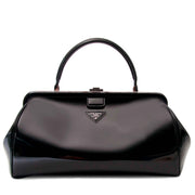 Prada Black Patent Bowling Bag Buy authentic designer Prada secondhand bags at Labellov at the best price. Safe and secure shopping. Koop tweedehands authentieke Prada tassen bij designer webwinkel labellov.