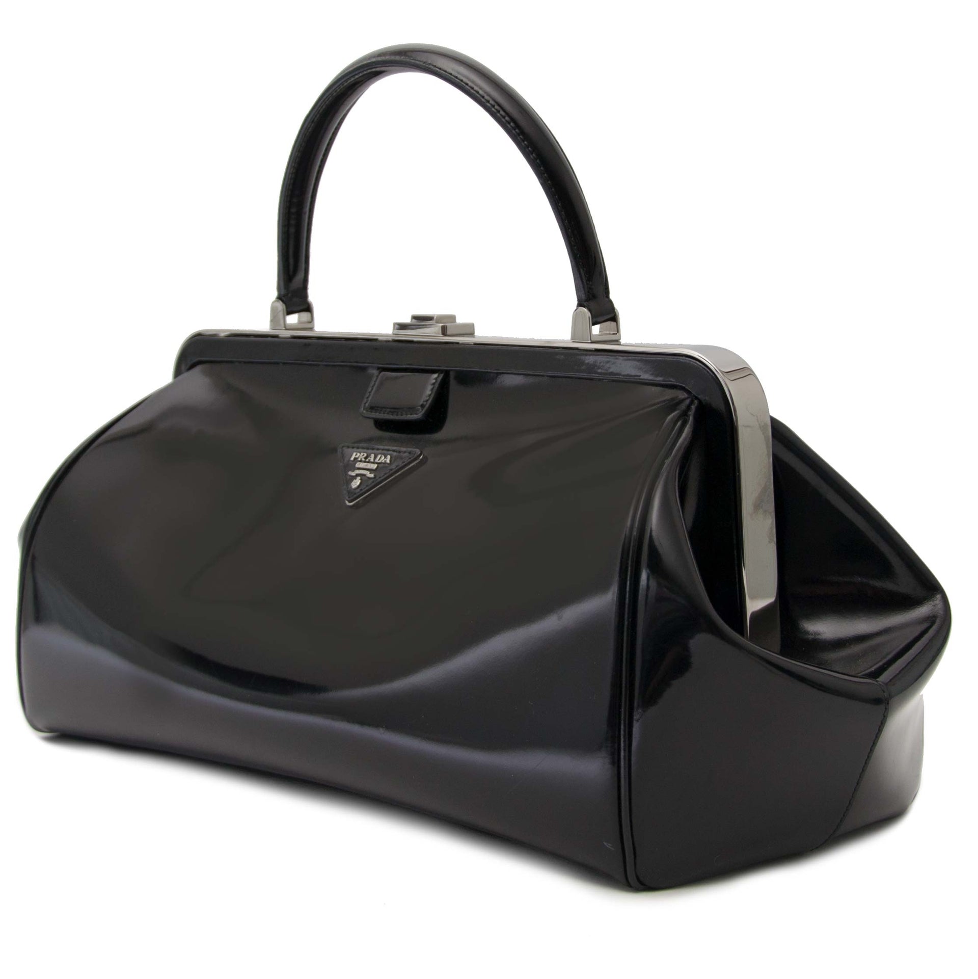 Prada Black Patent Bowling Bag Buy authentic designer Prada secondhand bags at Labellov at the best price. Safe and secure shopping. Koop tweedehands authentieke Prada tassen bij designer webwinkel labellov.