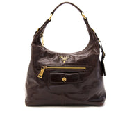 Buy authentic Prada Brown Leather Shoulder Bag at the right price at LabelLOV vintage webshop. Luxe, vintage, fashion. Safe and secure online shopping. Antwerp, Belgium.