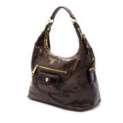 Authentieke Prada Brown Leather Shoulder Bag voor de juiste prijs bij LabelLOV vintage webshop. Veilig online winkelen. Luxe, vintage, mode. Antwerpen, België.