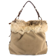 Prada Logo Jacquard and Fur Leather Bag for sale at Labellov secondhand luxury in Antwerp