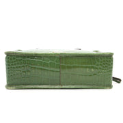 Heute können Sie diese Prada Grüne St. Coco Bauletto Handtasche aus Leder und mit Krokorelief auf labellov.com ankaufen.
