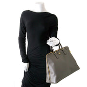 prada grey saffiano lux bauletto bag now for sale at labellov vintage fashion webshop belgium
