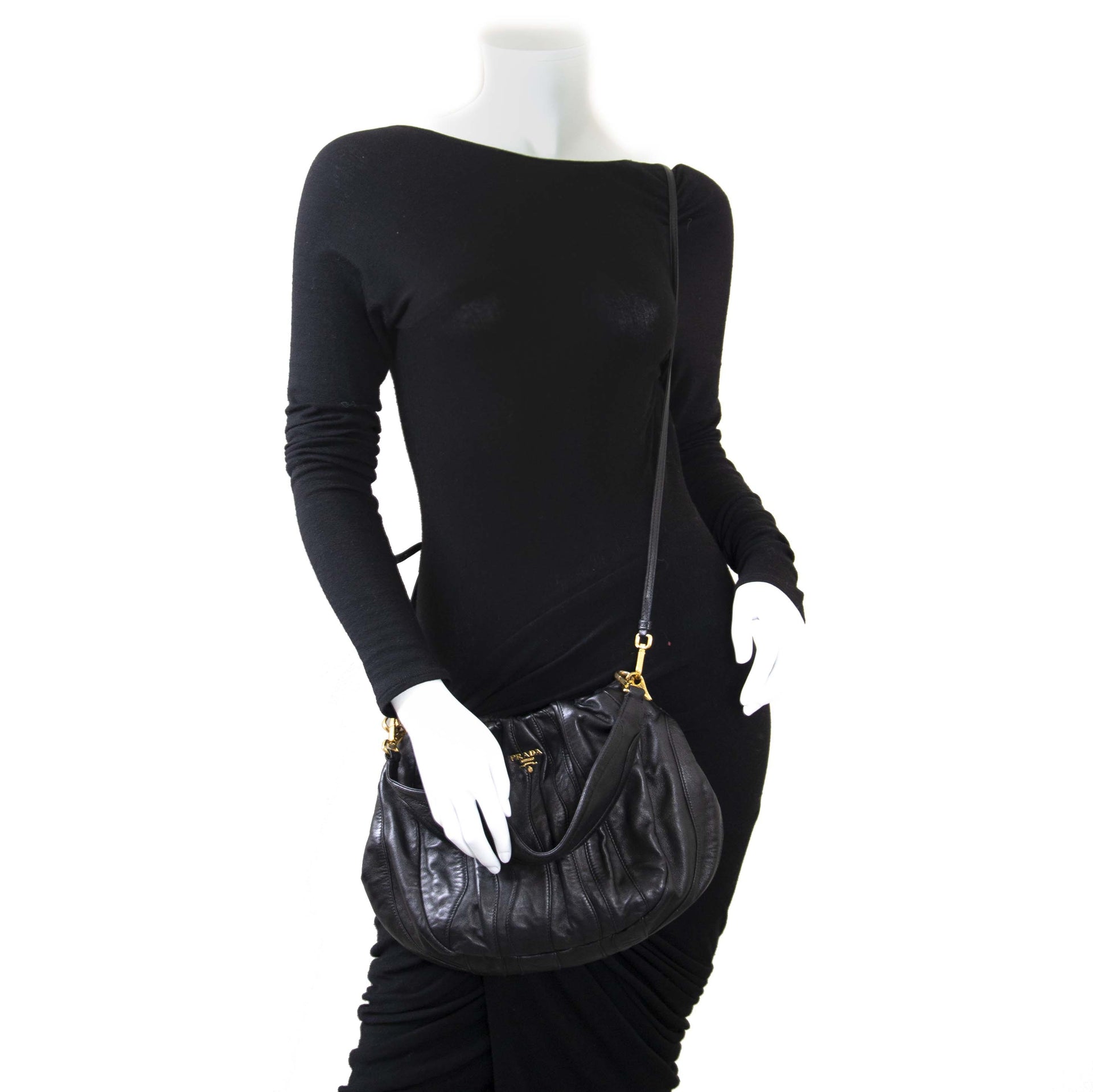 Are you interested in an authentic Prada Round Black Leather Shoulder Bag? Buy online at Labellov.